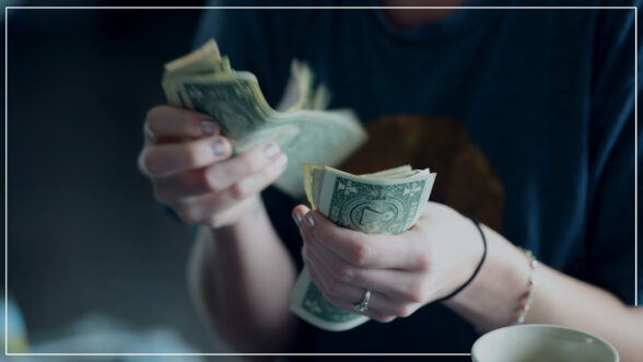 Image of a person counting money