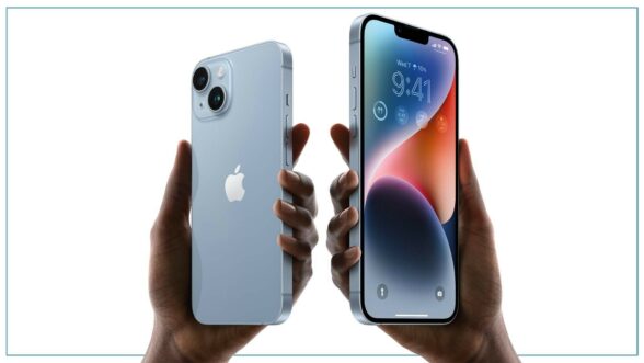 Two hands holding Apple's new iPhone models.