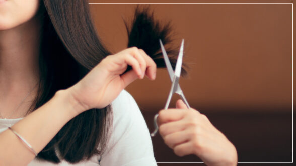 Image of a woman cutting her hair