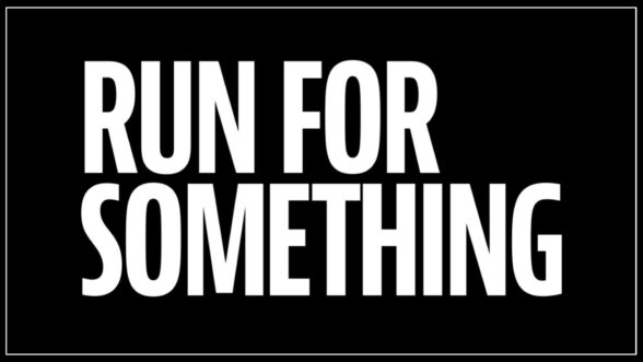 Image of the white Run For Something logo over a black background